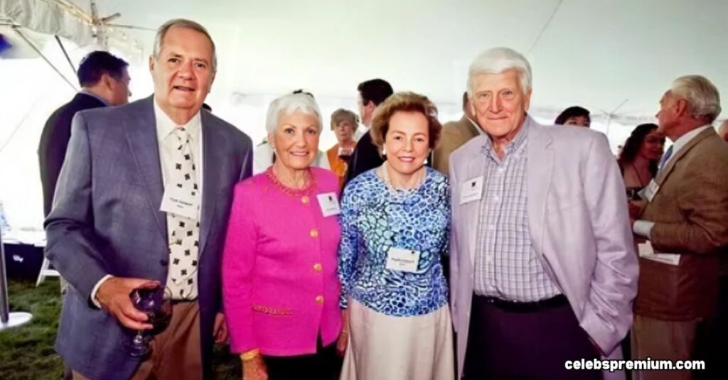 4 persons of Cargill family posing in the image.
